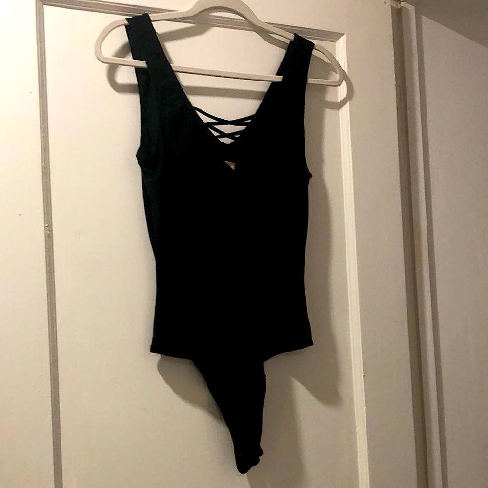 GB Black bodysuit with snapped crouch.